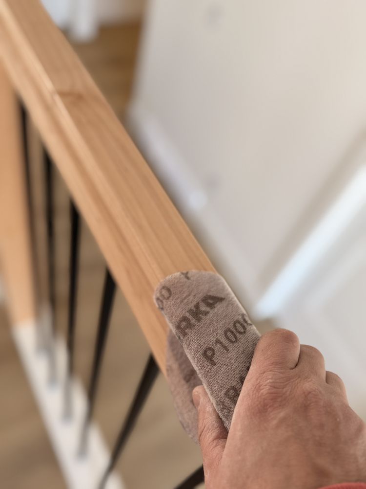 Walls being sanded smooth